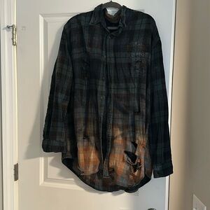 Custom made flannel with distressing and graphic on the back!
